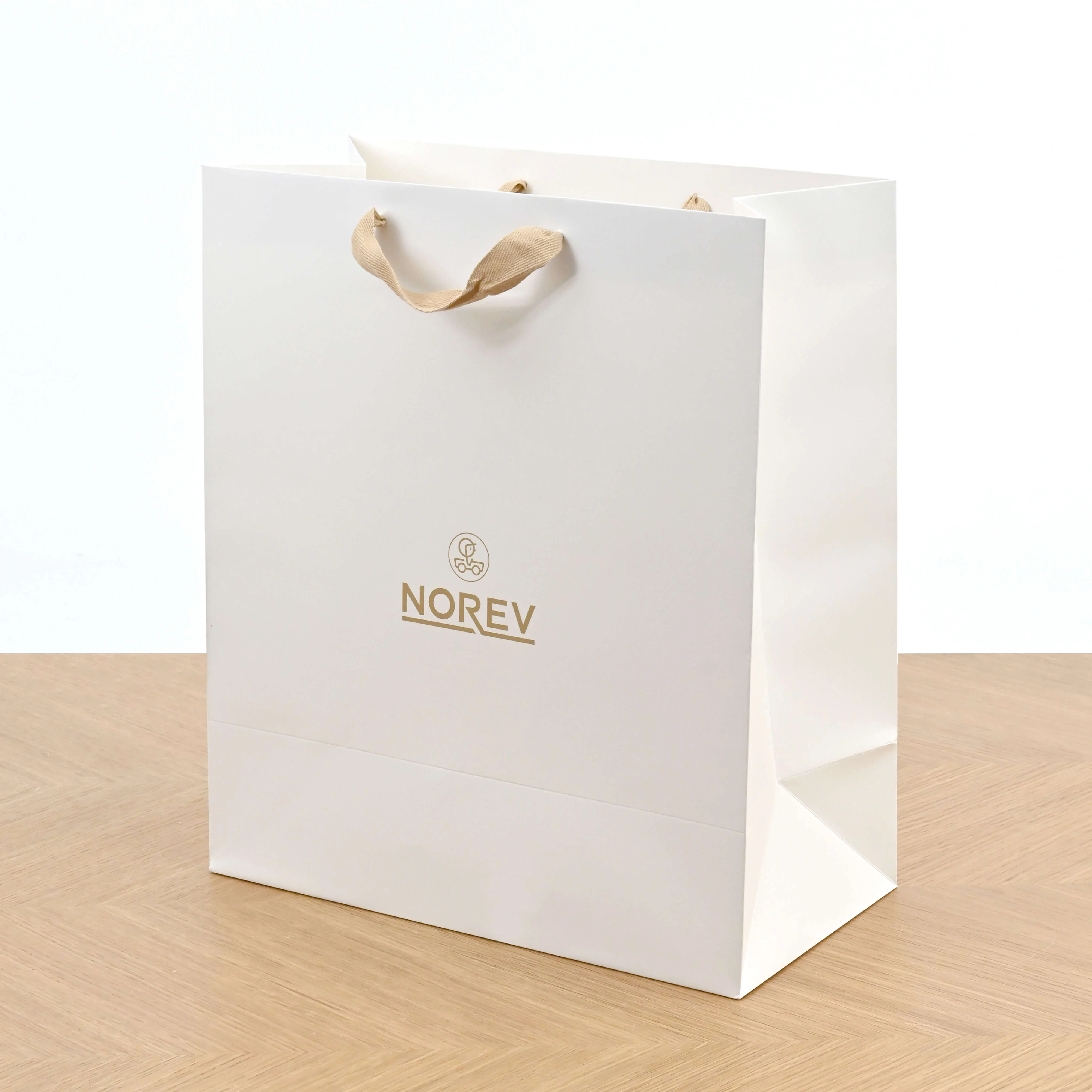 14 years old Matte white bag with beige ribbon handles No reviews