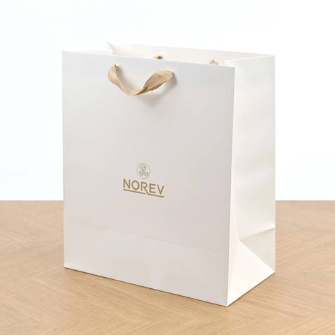 14 years old Matte white bag with beige ribbon handles No reviews